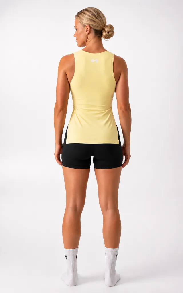 LINDA_BUTTERYELLOW_BACK_v2_open-side_headtoside.webp